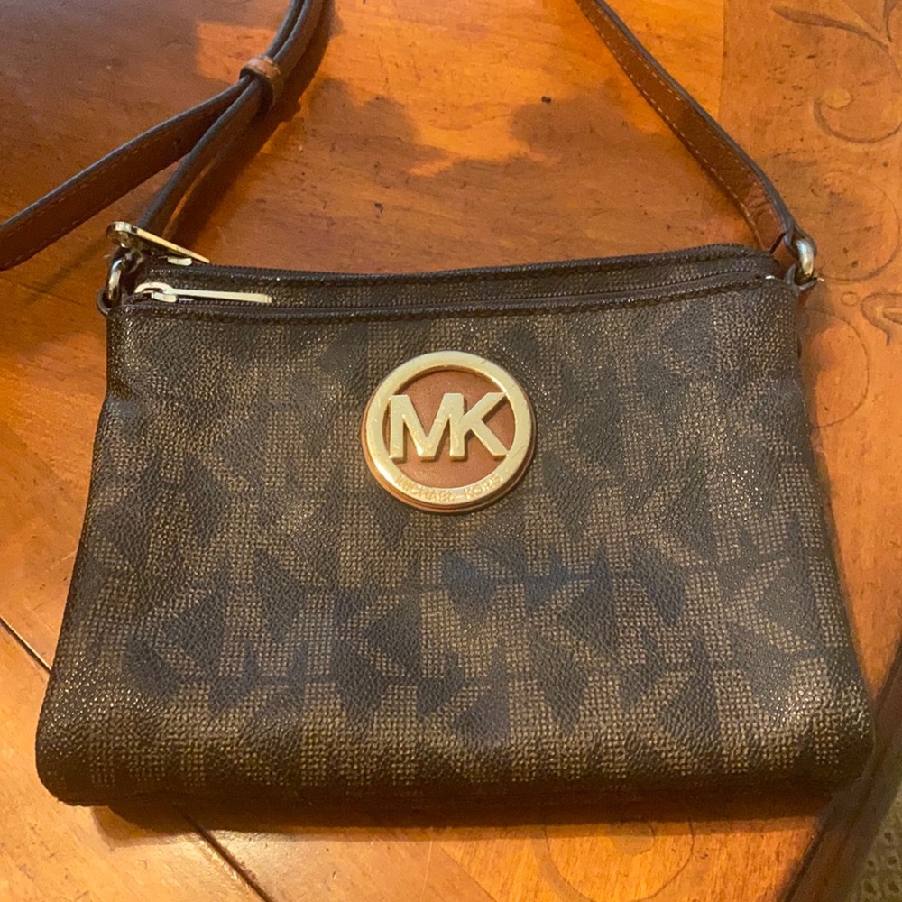 Used Michael Kors crossover wallet. No tears.